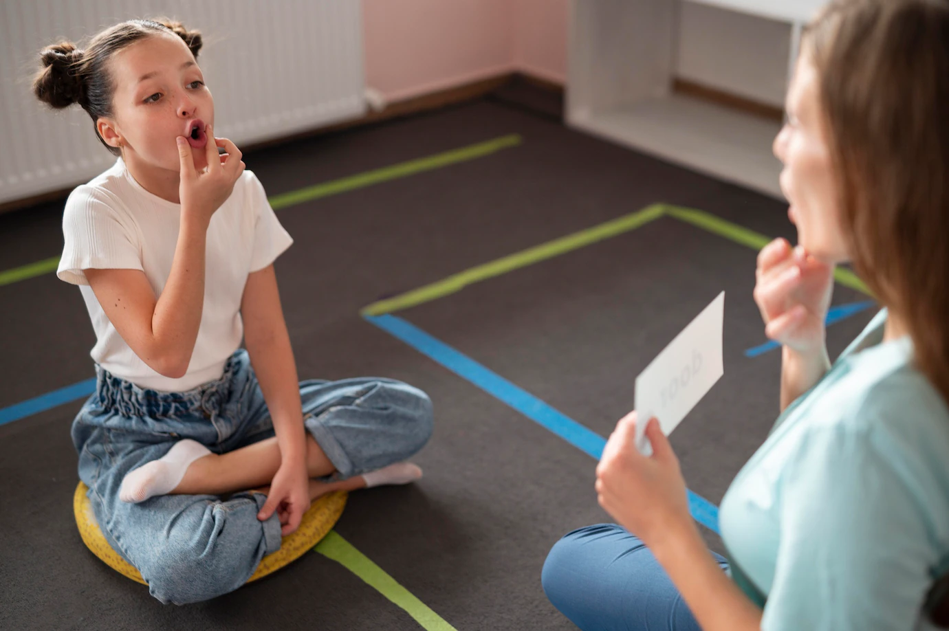 psychologist-helping-little-girl-speech-therapy-indoors_23-2149113838 psychologist-helping-little-girl-speech-therapy-indoors_23-2149113838